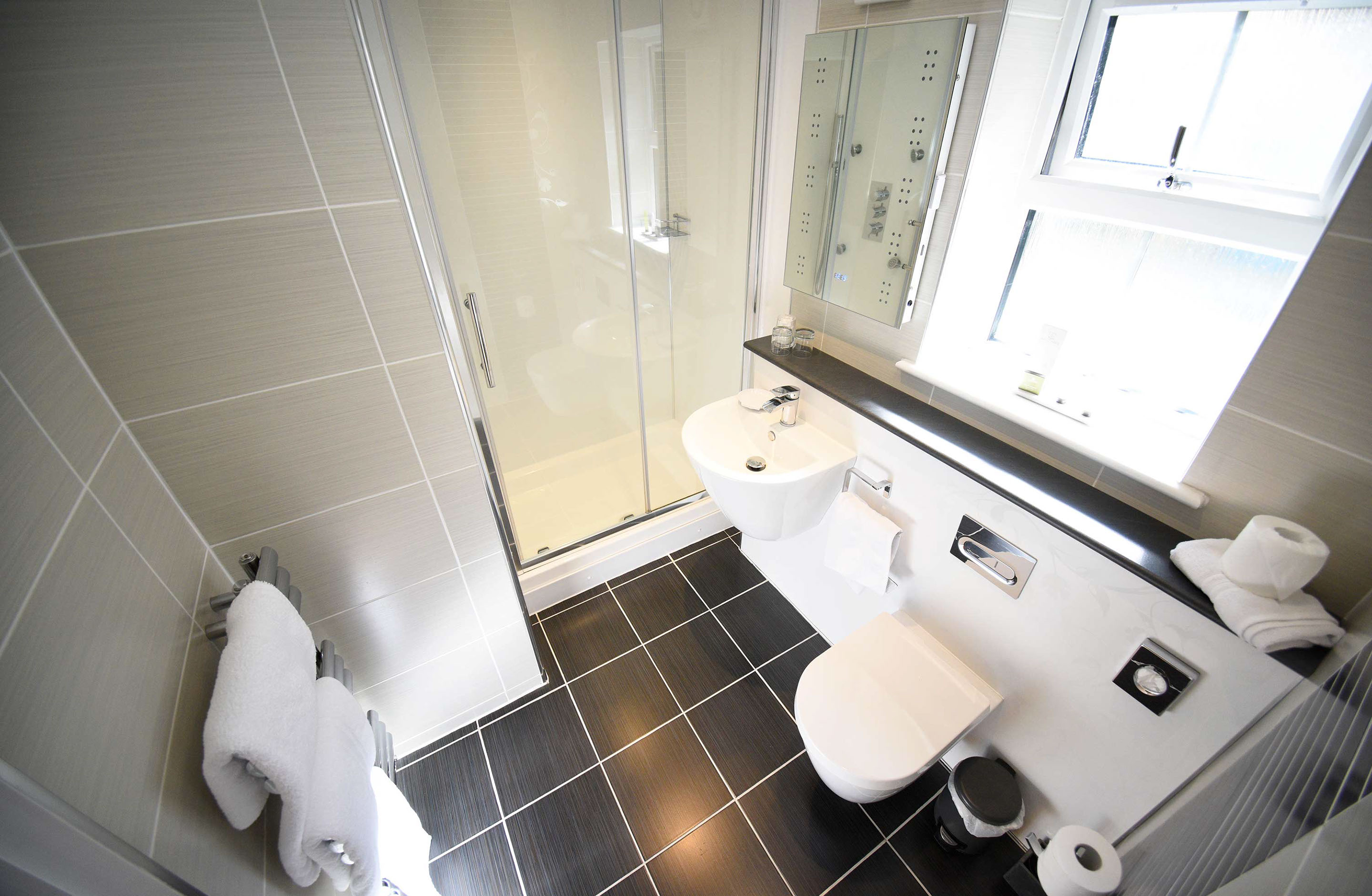 En Suite Shower Rooms with Electric Towel Rails and Electric Mirrors at Heatherfield House Bed and Breakfast