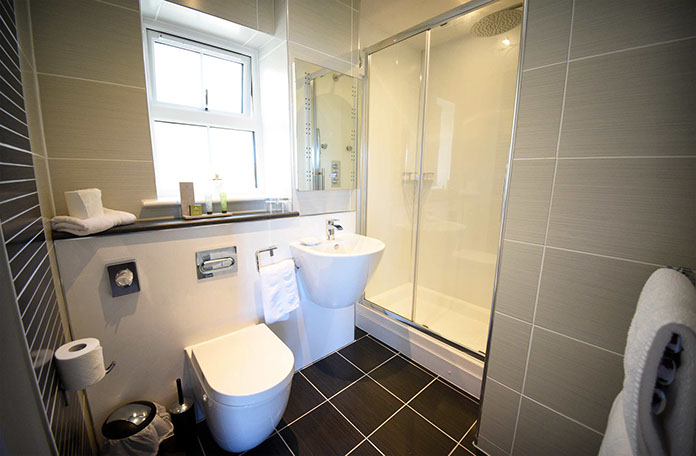 En Suite Shower Rooms with Electric Towel Rails Anti Steam Mirrors at Heatherfield House