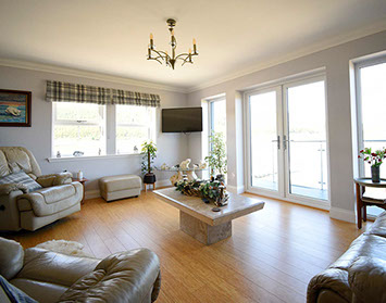 Open Plan Living Room with Sea Views at Heatherfield House Bed and Breakfast