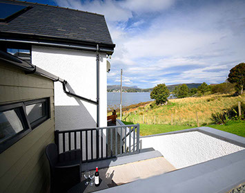 Our Self Catering Accommodation near Portree features a private sea view outside seating area