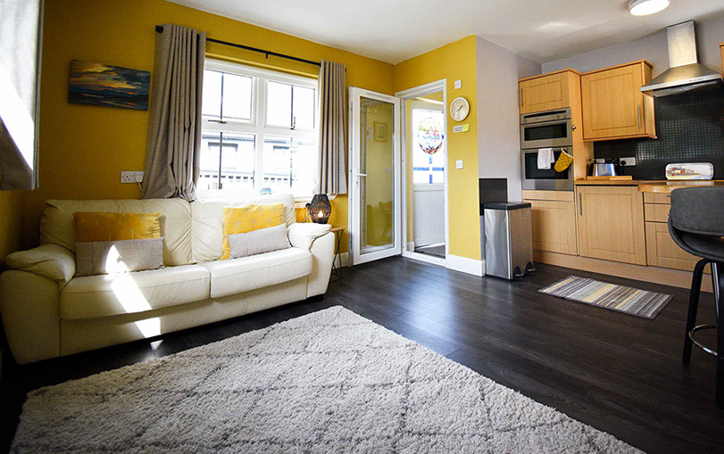 Heatherfield House Self Catering Accommodation near Portree contains a spacious living room with WIFI and Widescreen TV