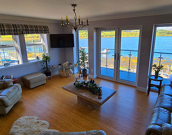 Heatherfield House features a sea view living room with comfortable seating Widescreen TV and WIFI Internet access 